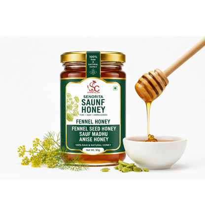 A jar of Senorita Saunf Honey (fennel seed honey) is displayed on a white background with a wooden honey dipper dripping honey into a small white bowl, accompanied by fresh fennel flowers and seeds.Buy Senorita Honey Now At SenoritaCare Store- By SenoritaCare